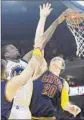  ?? Ben Margot Associated Press ?? TIMOFEY MOZGOV, right, had no points in nine minutes in Game 5 of the NBA Finals.