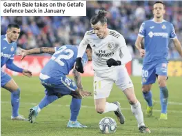  ??  ?? Gareth Bale takes on the Getafe defence back in January