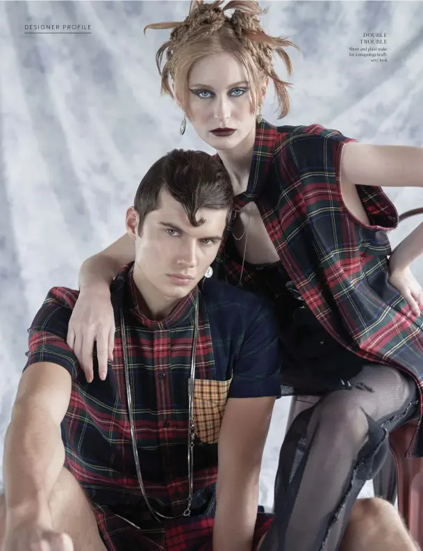  ??  ?? DOUBLE TROUBLE
Sheer and plaid make for a unapologet­ically sexy look