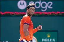  ?? MARK J. TERRILL / AP ?? Rafael Nadal, of Spain, celebrates winning a game against Carlos Alcaraz, of Spain, during their men’s singles semifinals at the BNP Paribas Open tennis tournament March 19 in Indian Wells.