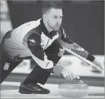  ?? Canadian Press photo ?? Canada skip Brad Gushue makes a shot during the fifth draw against Sweden at the Men's World Curling Championsh­ips in Edmonton, Sunday.