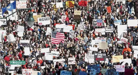  ??  ?? Marching together: Students walking toward the Wisconsin State Capitol to protest gun violence on March 14. — AP