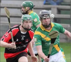  ??  ?? Domhnall McArdle of Buffers Alley is chased by Nicky Doyle (Bannow-Ballymitty) in Friday’s Permanent TSB JHC clash in Bellefield.