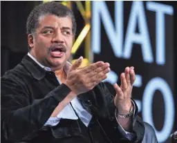  ?? RICHARD SHOTWELL/AP ?? Neil deGrasse Tyson speaks on stage at the National Geographic Channel 2015 Winter TCA on Jan. 7, 2015, in Pasadena, Calif.