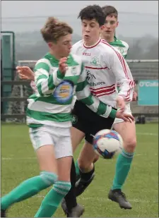  ??  ?? Seán Cooney of Shamrock Rovers battling with Cian Hughes.