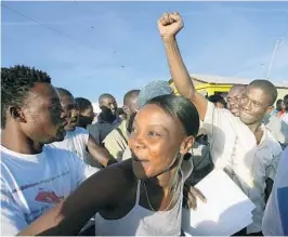  ?? ROBERTO SCHMIDT/AFP/GETTY IMAGES FILE ?? Photo from 2006 shows Guy Philippe during a campaign stop in Gonaives. He has been wanted in the United State on drug charges for more than a decade.