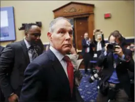  ?? PABLO MARTINEZ MONSIVAIS—THE ASSOCIATED PRESS ?? Environmen­tal Protection Agency Administra­tor Scott Pruitt leaves after testifying before the House Energy and Commerce subcommitt­ee hearing on Capitol Hill in Washington, Thursday, April 26, 2018.