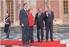  ?? MICHEL EULER, AP ?? French President François Hollande, waving, greets, from left, Spanish Prime Minister Mariano Rajoy, German Chancellor Angela Merkel and Italian Prime Minister Paolo Gentiloni at the Versailles castle near Paris on Monday. Their summit is in...