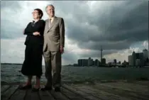  ?? TORONTO STAR FILE PHOTO ?? Barry Lord and his wife, Gail, stand before the Toronto skyline in 2005. They were working on a museum project to tell the story of the city at that time.