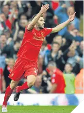  ??  ?? Adam Lallana celebrates.