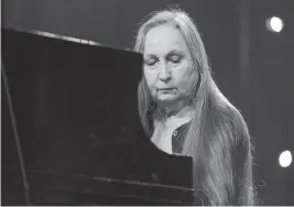 ?? RICH FURY Rich Fury/Invision/AP ?? Bobbie Nelson performs at the Heartbreak­er Banquet in Spicewood, Texas, on March 19, 2015. Nelson, the older sister of country music legend Willie Nelson and longtime pianist in his band, died Thursday at the age of 91.