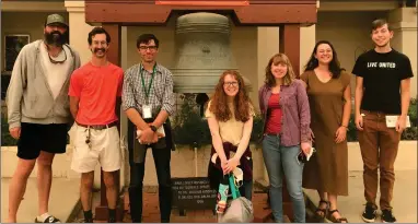  ?? RECORDER PHOTO BY CHARLES WHISNAND ?? A group of archeologi­sts pose with the 1895 Fire Bell at the Portervill­e Historical Museum on Tuesday, September 24, 2021.