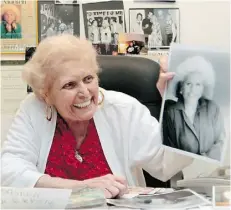  ?? ALAN DIAZ/ THE ASSOCIATED PRESS/ FILE ?? Weight Watchers founder Jean Nidetch holds up a photo of herself at her home in Parkland, Fla., in 2011.