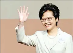  ?? AFP ?? Carrie Lam waving after she won the Hong Kong chief executive election in Hong Kong on March 26, 2017.