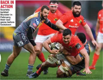  ?? Picture: RAMSEY CARDY ?? BACK IN ACTION Scarlets tackled Munster in February, their last game before lockdown