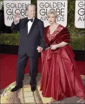  ?? PHOTO BY JORDAN STRAUSS — INVISION — AP, FILE ?? Brian Wilson, left, and his wife, Melinda, arrive at the 73rd annual Golden Globe Awards in Beverly Hills on Jan. 10, 2016.