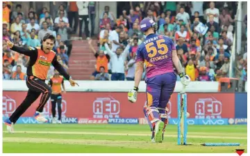  ?? Photos: P. SURENDRA ?? Rashid Khan of Sunrisers Hyderbad celebrates the wicket of Pune’s Ben Stokes during an IPL match in Hyderabad on Saturday.