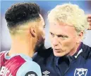  ??  ?? VICTORY Moyes with Ryan Fredericks