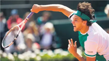  ?? Picture: Getty Images ?? GIANT-KILLER. Dominic Thiem of Austria serves in his French Open quarterfin­al against Novak Djokovic of Serbia at Roland Garros in Paris yesterday.