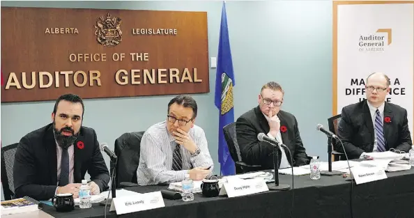  ?? LARRY WONG ?? Members of the Alberta Auditor General’s office — including Auditor General Doug Wylie — unveil their latest report Wednesday.