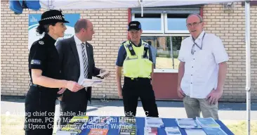  ??  ?? Acting chief constable Janette McCormick, PCC David Keane, PCSO Mines and Cllr Phil Harris outside Upton Community Centre in Widnes