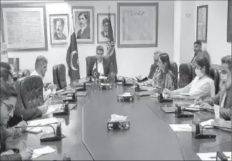  ??  ?? Federal Minister for Law and Justice, Barrister Dr. Farogh Naseem chairing a meeting regarding Criminal Law Reforms at Ministry of Law and Justice.
-APP