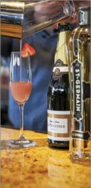  ?? PHOTO COURTESY OF PARAMOUR ?? A Parisian Spritz is a spin on the classic combinatio­n of sparkling wine and peach puree.