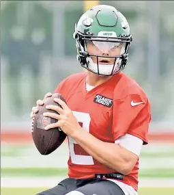  ?? Bill Kostroun ?? HEY, MR. WILSON: Rookie Zach Wilson’s play in his first Jets training camp will be under the microscope, but it’s important not to blow anything out of proportion, writes The Post’s Brian Costello.