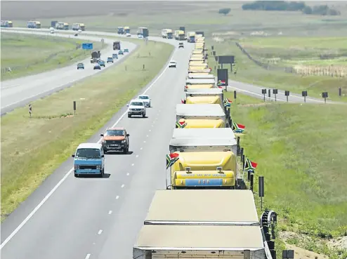  ?? Picture: Gallo Images/Deaan Vivier ?? The soaring fuel price affects every aspect of the South African economy — even charitable acts. Here, 31 trucks transport feed from Delmas to the drought-stricken Western Cape this time last year, after farmer Jannie Neuhoff donated 1,500 bales of feed worth R500,000 to his fellow farmers.