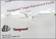  ?? AP file photo ?? The Vanguard Group investment advisers said Monday that the company will stop charging commission­s for online trades of its competitor­s’ exchange-traded funds.