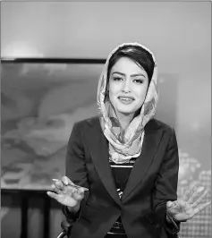  ??  ?? An Afghan presenter records her morning programme at the Zan TV (Women’s TV) station in Kabul. — AFP photos