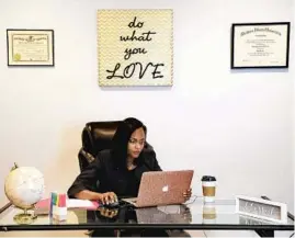  ?? ABEL URIBE/CHICAGO TRIBUNE ?? Sharonda Roberson prepares for a court case via Zoom in her law office in Aurora. After the May 31, 2020, unrest in the city, Roberson helped found The People’s Coalition, organized a peace rally and created a Facebook group.