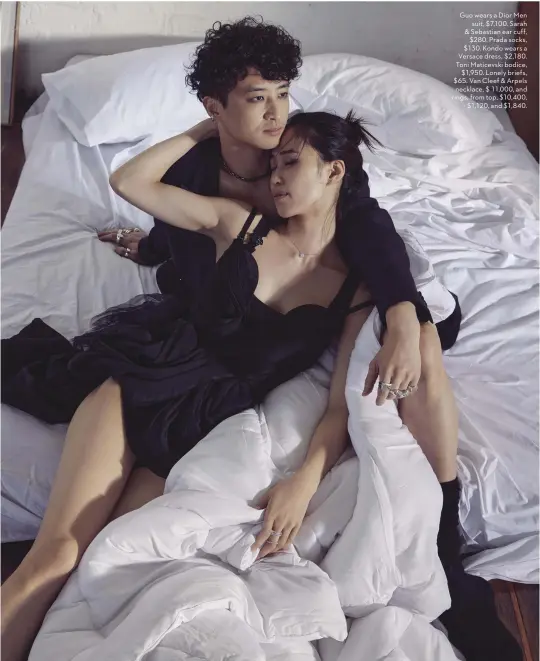  ??  ?? Guo wears a Dior Men suit, $7,100. Sarah & Sebastian ear cuff, $280. Prada socks, $130. Kondo wears a Versace dress, $2,180. Toni Maticevski bodice, $1,950. Lonely briefs, $65. Van Cleef & Arpels necklace, $ 11,000, and rings, from top, $10,400, $1,120, and $1,840.