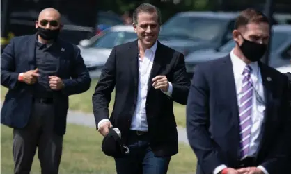  ?? ?? Hunter Biden walks to Marine One on the Ellipse outside the White House in May 2021. Photograph: Brendan Smialowski/AFP/Getty Images