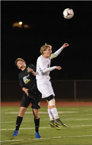  ??  ?? Burrillvil­le senior Nick Hammond, right, scored his team’s lone goal in a 2-1 Division to rival North Smithfield Tuesday night.
II road defeat