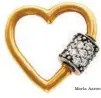  ?? Marla Aaron ?? Marla Aaron Designer Marla Aaron’s modern Diamond Baby lock heart charm with white diamonds in 14-karat gold. $1,863. Available at ylang23.com.