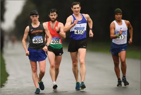  ??  ?? David Kenny, Farranfore Maine Valley AC, on the left, in action in the men’s 20k event during Irish Life Health National Race Walking Championsh­ips 2018 at St. Anne’s Park in Dublin. Photo by Sportsfile