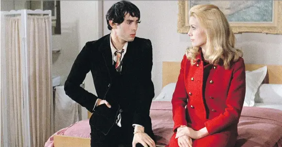  ?? PARIS FILM PRODUCTION­S ?? Pierre Clémenti, left, and Catherine Deneuve star in Belle de Jour, a newly restored 1967 film about a housewife who spends her afternoons working in a brothel.