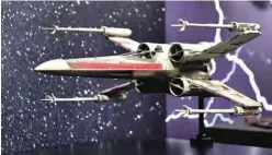  ?? ?? A photomatch­ed 1976 Pyro X-Wing Starfighte­r model miniature from the 1977 film ‘Star Wars: A New Hope’ is displayed at Propstore.