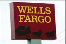  ?? THE ASSOCIATED PRESS ?? A Wells Fargo bank sign is shown in northeast Jackson, Miss.