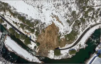  ?? CALTRANS — CONTRIBUTE­D PHOTOS ?? An aerial view of the massive landslide located at the 15.2mile post in Plumas County, pictured Wednesday.