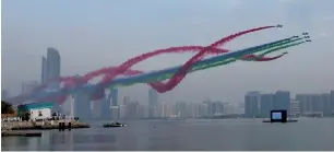  ?? — Photo by Ryan Lim ?? Al Forsan Aerobatics team performs an aerobatic show spewing out the UAE flag colours during an hour long military demonstrat­ion held at the Abu Dhabi Corniche on Thursday.