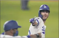  ?? ERIC GAY — THE ASSOCIATED PRESS ?? The Dodgers’ Cody Bellinger celebrates his two-run home run against the Tampa Bay Rays during the fourth inning on Tuesday.