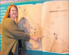  ??  ?? Sharlene Rumney points to areas on the old Tauranga County map where women were land owners.