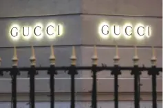  ??  ?? Gucci signs are seen outside a shop in Paris, France. Kering’s fashion powerhouse Gucci is bringing more manufactur­ing in-house, as luxury firms step up efforts to meet rampant demand from Chinese shoppers with slicker operations. — Reuters photo