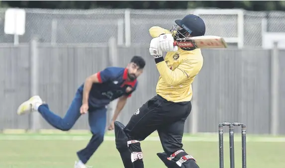  ?? ?? Hard-hitting Zeeshan Manzoor has started the summer well for Peterborou­gh Town. Photo David Lowndes.