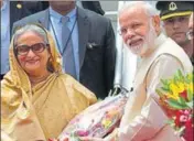  ?? AP ?? Bangladesh Prime Minister Sheikh Hasina is welcomed by Prime Minister Narendra Modi on her arrival in New Delhi on Friday.