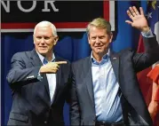  ?? HYOSUB SHIN/AJC 2018 ?? Vice President Mike Pence, who came to Georgia to campaign for Brian Kemp in his successful 2018 governor’s race, is returning to the state to rally support for his reelection.