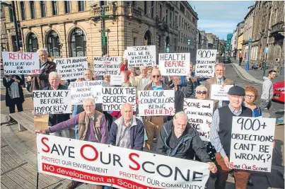  ?? Picture: Steve Macdougall. ?? A protest against proposed developmen­t in Scone at Perth and Kinross Council headquarte­rs, High Street, Perth.