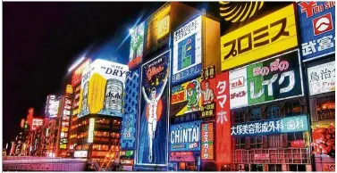  ??  ?? Let the lights of Dotonbori in Osaka dazzle you.